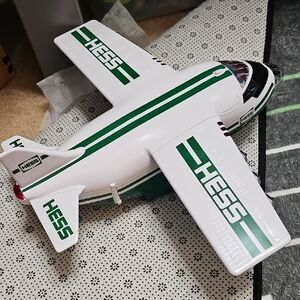 Green and White Toy Plane